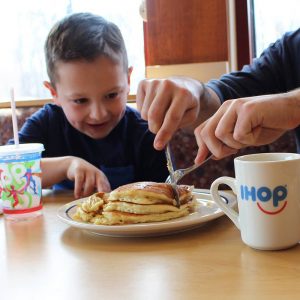 Child Eating IHOP Pancakes