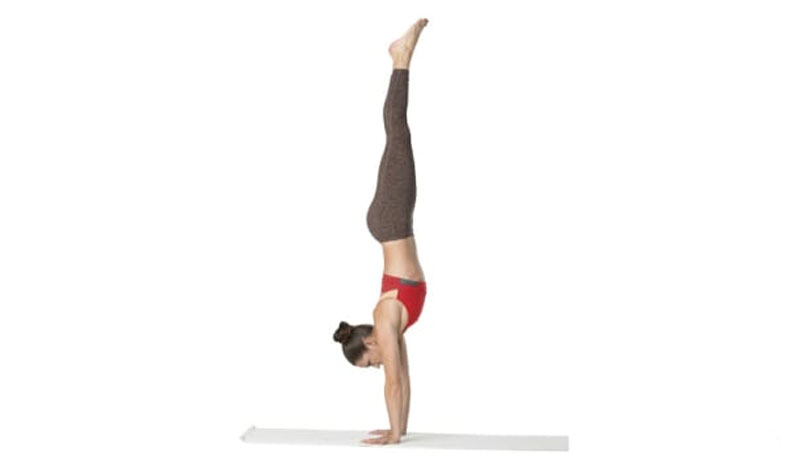 woman doing inversion yoga