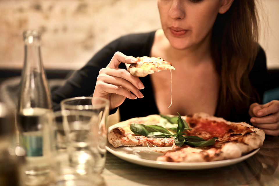 woman eating at a restaurant